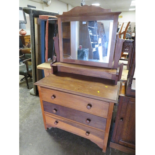 716 - A VINTAGE THREE DRAWER DRESSING TABLE