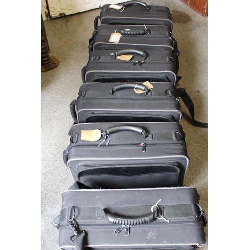 123 - SIX ASSORTED CASED CORNETS