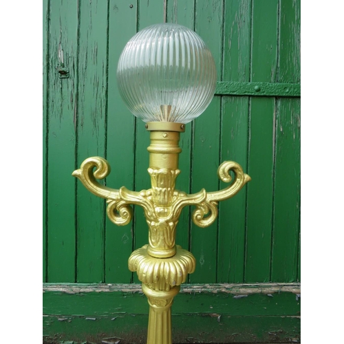 65 - SOLID CAST ALLOY PIER LIGHT MOUNTED ON A ROUND STEEL BASE