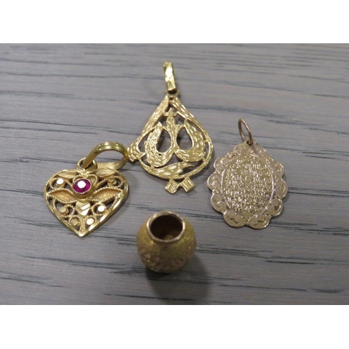 229 - A COLLECTION OF CONTINENTAL GOLD AND YELLOW METAL JEWELLERY TO INCLUDE PENDANTS AND A RING ETC (5) A... 