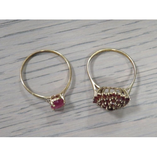 240 - A LADIES 10K GEMSET RING TOGETHER WITH A YELLOW METAL GARNET CLUSTER RING  (2)