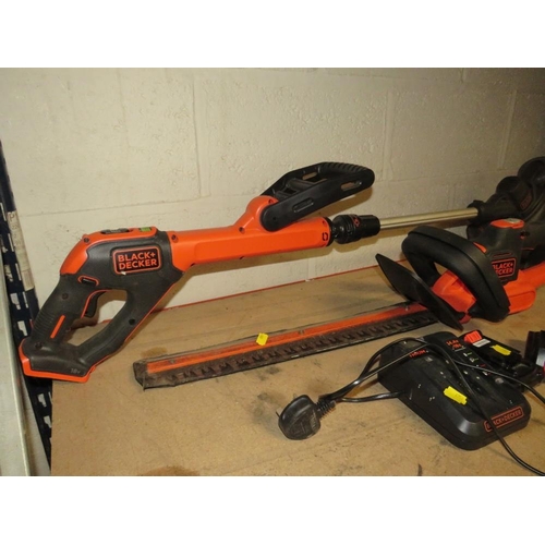 529 - A BLACK & DECKER 18V CORDLESS STRIMMER TOGETHER WITH A CORDLESS HEDGE TRIMMER CHARGER AND BATTERY