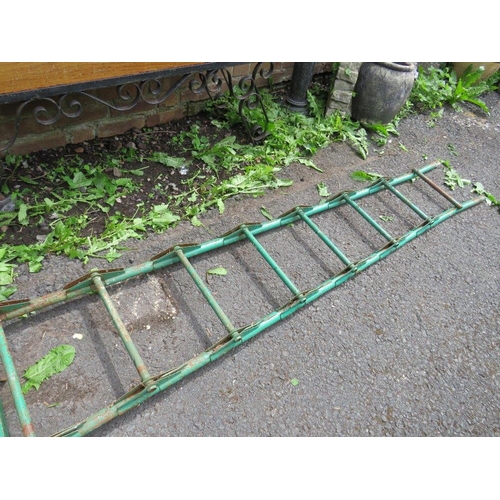 555 - A VINTAGE GREEN  METAL MILITARY LADDER AND A BED BASE ETC