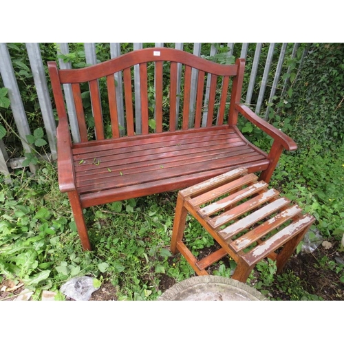 560 - A HARDWOOD GARDEN BENCH AND TABLE