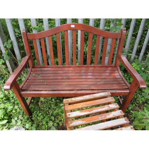 560 - A HARDWOOD GARDEN BENCH AND TABLE