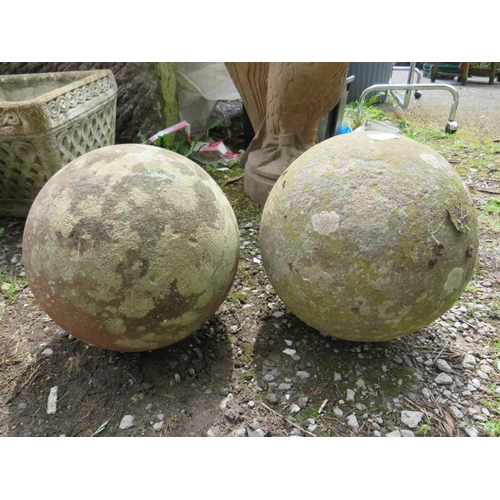 563 - TWO ANTIQUE SANDSTONE BALLS