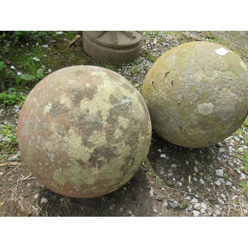 563 - TWO ANTIQUE SANDSTONE BALLS