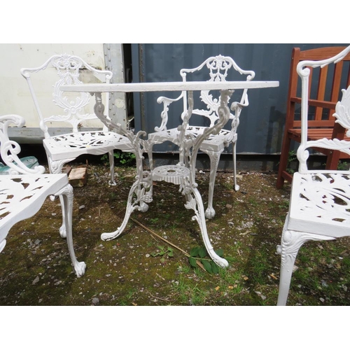 569 - A WHITE PAINTED CAST ALLOY PATIO TABLE AND FOUR CHAIRS