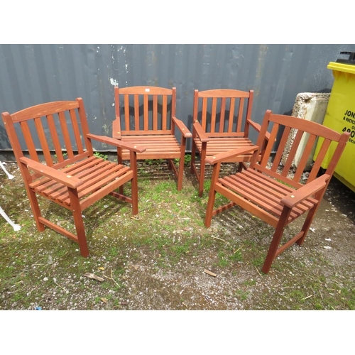 570 - A SET OF FOUR HARDWOOD GARDEN ARMCHAIRS