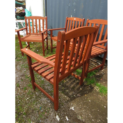 570 - A SET OF FOUR HARDWOOD GARDEN ARMCHAIRS