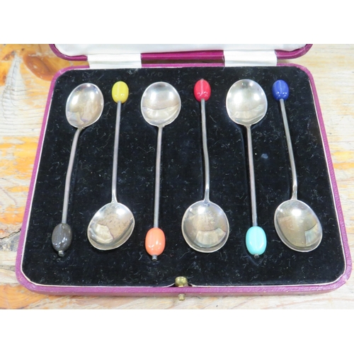 185 - A CASED SET OF HALLMARKED SILVER COFFEE BEAN SPOONS