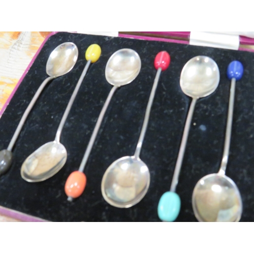 185 - A CASED SET OF HALLMARKED SILVER COFFEE BEAN SPOONS