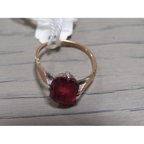 199 - A LADIES FILIGREE RING SET WITH RED STONE - MARKED 9CT GOLD- APPROX WEIGHT 2G