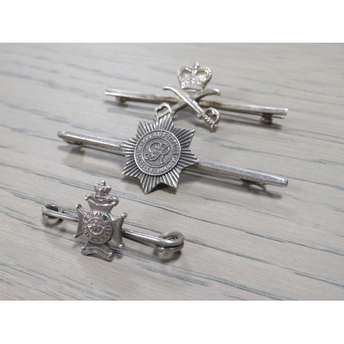 206 - THREE MILITARY SILVER BAR BROOCHES