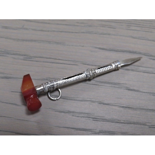 213 - AN ANTIQUE SILVER AND AGATE NOVELTY TOOTH PICK