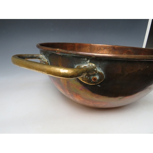 139 - A LARGE BRASS AND COPPER TWIN HANDLED DOMED BOWL, H 24 cm, Dia. 70 cm