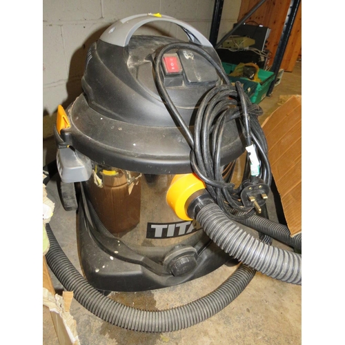 663 - A KARCHER 520M PRESSURE WASHER WITH EXTRA PATIO LANCE AND A TITAN TTB430 VACUUM CLEANER