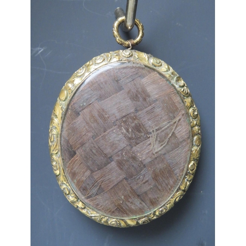 100 - A 19TH CENTURY OVAL PORTRAIT MINIATURE OF A GEORGIAN GENTLEMAN, with black coat and tie, unsigned, i... 