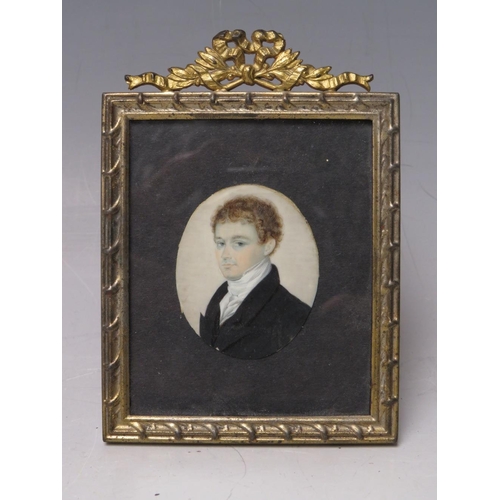 105 - A 19TH CENTURY OVAL PORTRAIT MINIATURE OF A YOUNG MAN, in a black jacket and white stock, unsigned, ... 