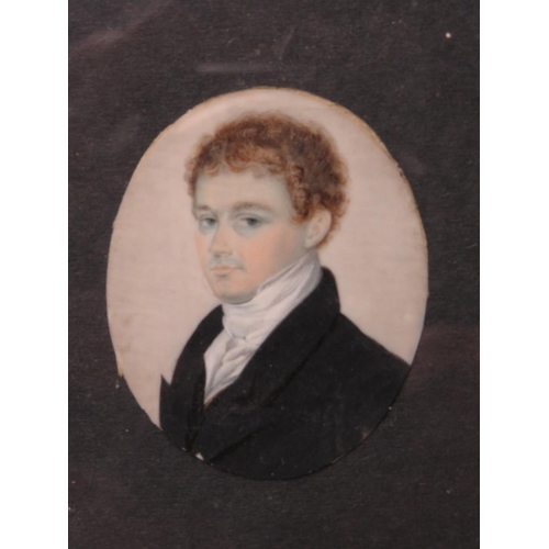 105 - A 19TH CENTURY OVAL PORTRAIT MINIATURE OF A YOUNG MAN, in a black jacket and white stock, unsigned, ... 