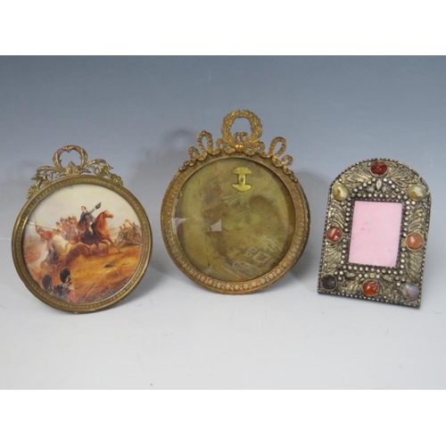 106 - FOUR LATE 19TH / EARLY 20TH CENTURY MINIATURE FRAMES, to include an adjustable example, smallest 3.5... 