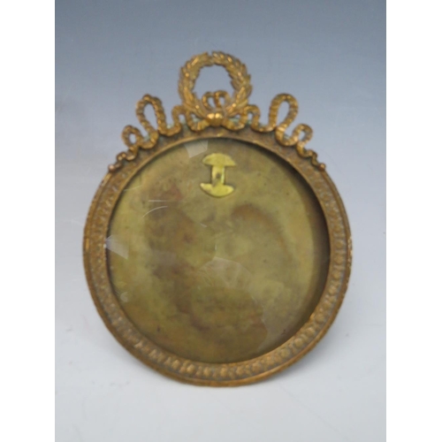 106 - FOUR LATE 19TH / EARLY 20TH CENTURY MINIATURE FRAMES, to include an adjustable example, smallest 3.5... 