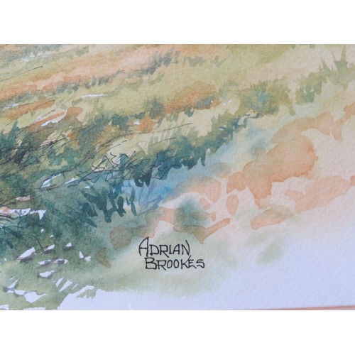 71 - ADRIAN BROOKES (b.1965). Wooded landscape with sheep by a stream, hills beyond, 'The Quiet Hills', s... 