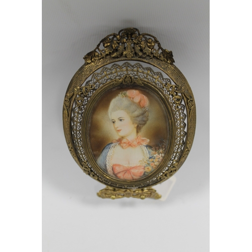 104 - COSE. Continental school, a late 19th / early 20th century oval portrait miniature of a young woman,... 