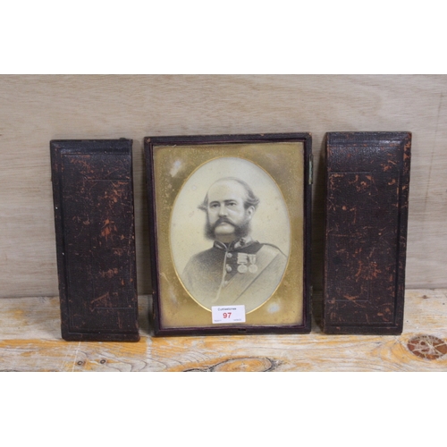 97 - G. DOWNES (XIX-XX). An oval portrait of an officer with medals, signed lower right, pencil heightene... 