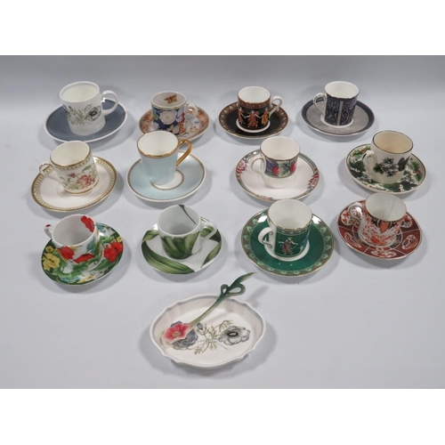 131 - A COLLECTION OF ELEVEN ROYAL WORCESTER COFFEE CANS AND SAUCERS, to include a selection reproduced fr... 