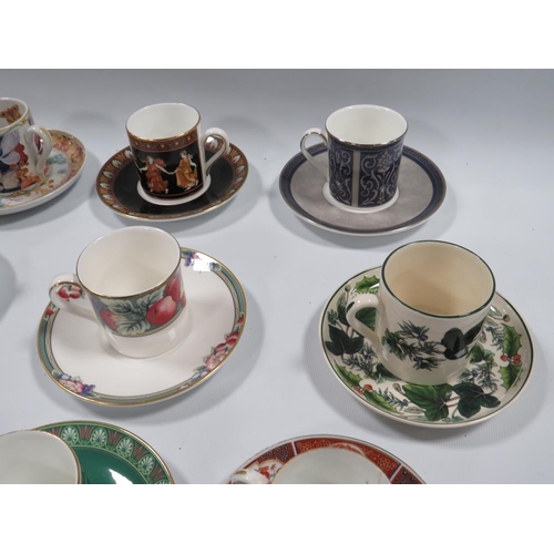 131 - A COLLECTION OF ELEVEN ROYAL WORCESTER COFFEE CANS AND SAUCERS, to include a selection reproduced fr... 