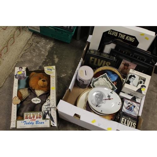 137 - A TRAY OF ASSORTED ELVIS COLLECTABLES TO INCLUDE MUGS AND A SINGING TEDDY BEAR