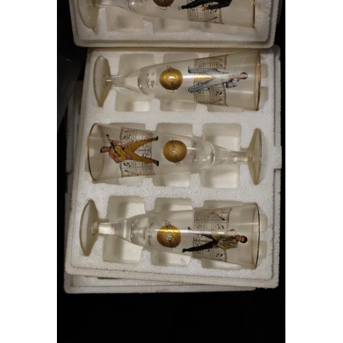 150 - A SET OF ELVIS  HIGH BALL GLASSES WITH WOODEN DISPLAY STAND