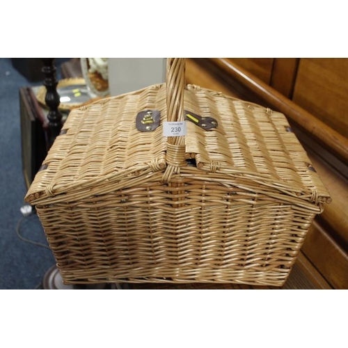 230 - A WICKER DOUBLE SIDED PICNIC HAMPER AND CONTENTS