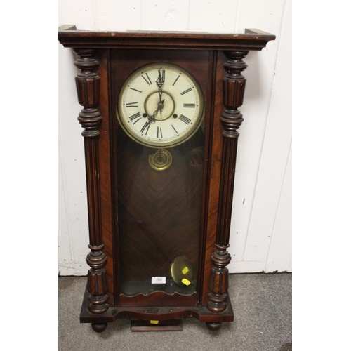 242 - A LARGE VINTAGE WALL CLOCK {WOODWORM}