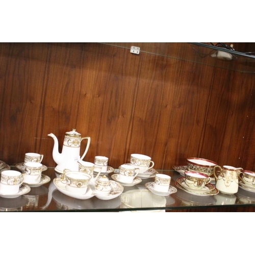 249 - A NORITAKE PART TEA & COFFEE SERVICE, comprising coffee pot, cream, sugar, six coffee cans and sauce... 