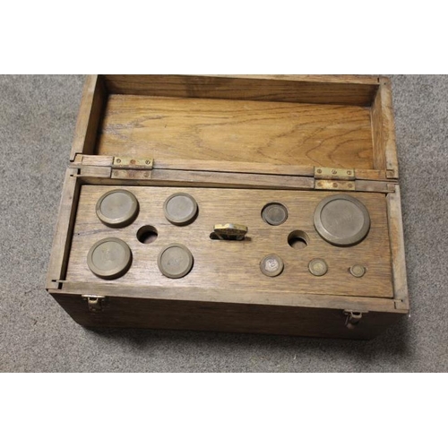 253 - A WOODEN CASED SET OF SCALES AND WEIGHTS UNCHECKED