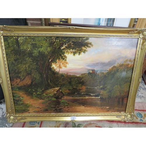 20 - A GILT FRAMED OIL ON CANVAS OF A HILLSIDE RIVER SCENE WITH A CASTLE IN THE DISTANCE