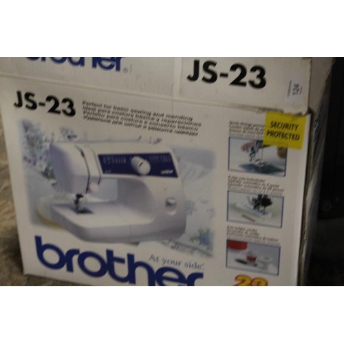 124 - A BOXED BROTHER JS'23 SEWING MACHINE (NOT TESTED )