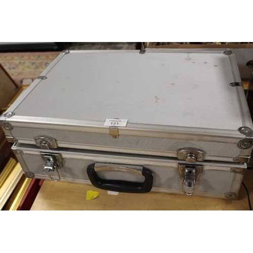 131 - A HARD CASE CONTAINING A CANNON MV20 PAL DIGITAL VIDEO CAMCORDER AND ACCESSORIES