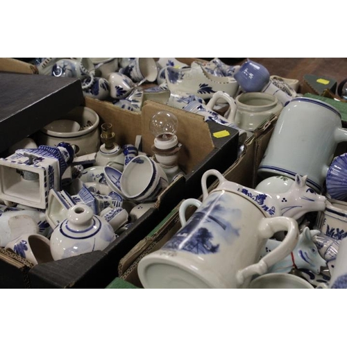 167 - THREE TRAYS OF MAINLY DUTCH BLUE/WHITE CERAMICS TO INCLUDE COW CREAMERS , WINDMILLS ETC