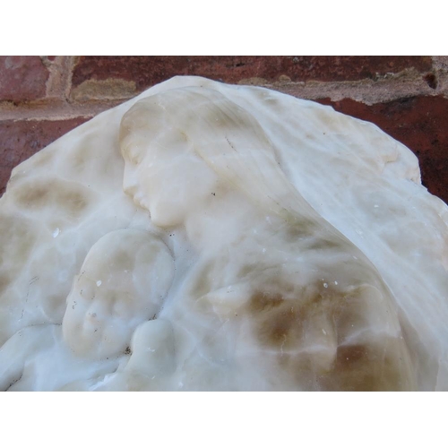 256 - AN ALABASTER MADONNA AND CHILD WALL HANGING SCULPTURE