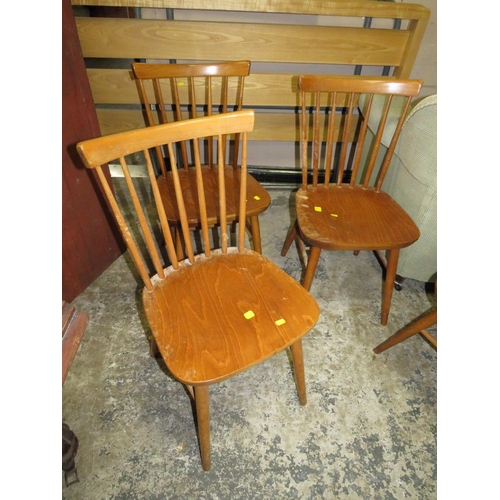 808 - A SET OF FOUR RETRO STICK BACK CHAIRS