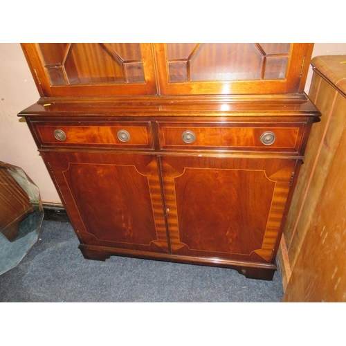 818 - A REPRODUCTION MAHOGANY GLAZED BOOKCASE