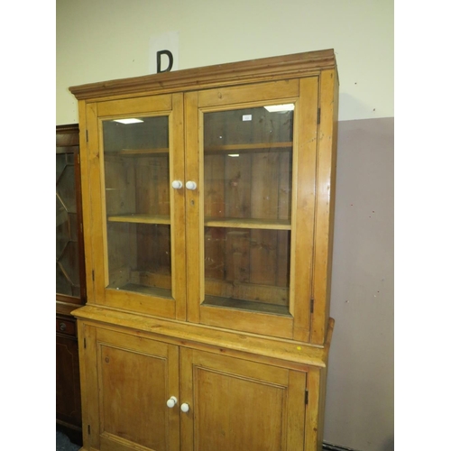 819 - AN ANTIQUE PINE GLAZED HOUSEKEEPERS CUPBOARD - H 210 cm, W 132 cm