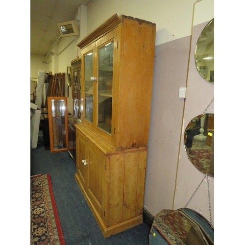 819 - AN ANTIQUE PINE GLAZED HOUSEKEEPERS CUPBOARD - H 210 cm, W 132 cm