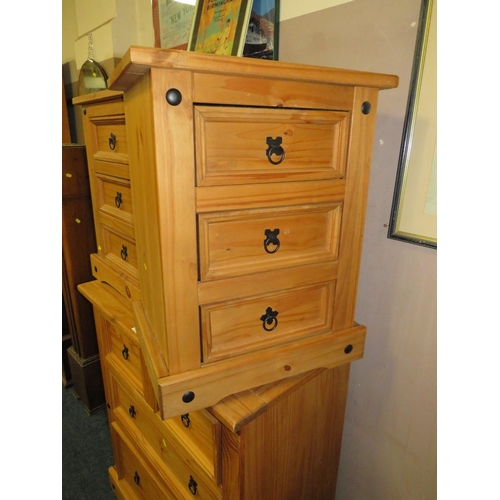 823 - A COLONIAL STYLE FOUR DRAWER CHEST WITH A PAIR OF BEDSIDE CHESTS (3)