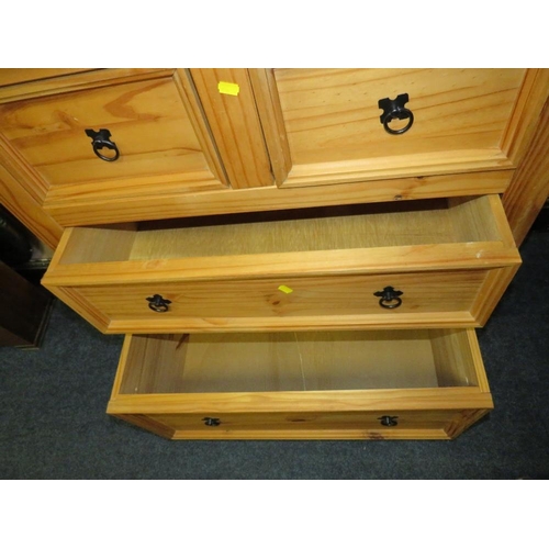 823 - A COLONIAL STYLE FOUR DRAWER CHEST WITH A PAIR OF BEDSIDE CHESTS (3)