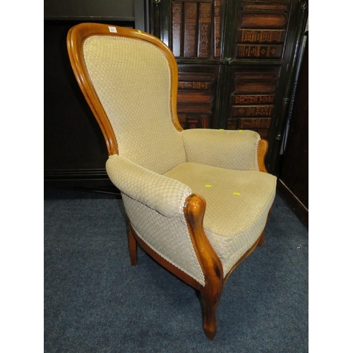 836 - A REPRODUCTION UPHOLSTERED GENTLEMANS ARMCHAIR