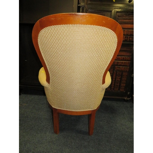 836 - A REPRODUCTION UPHOLSTERED GENTLEMANS ARMCHAIR